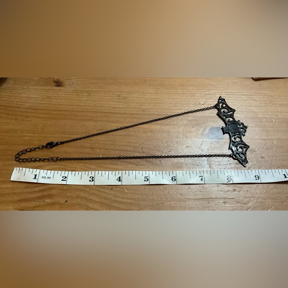 Gothic: metal bat necklace and two sets of dangle earrings biker core style too. - Picture 3 of 9